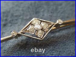 18ct YELLOW GOLD BAR BROOCH PANEL INSET WITH 5 DIAMONDS FLANKED BY 2 OTHERS 4g