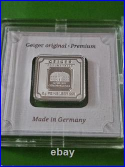 1/2 G. 9999 Gold Capsule & Geiger 5 Gram Silver Bar. 999 Fine In Assay Monarch