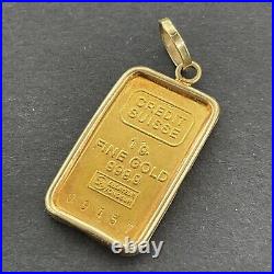 1 gram Credit Suisse 999,9 Fine Gold Minted Pendant Bar in 14K Tab Frame