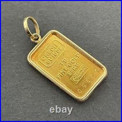 1 gram Credit Suisse 999,9 Fine Gold Minted Pendant Bar in 14K Tab Frame