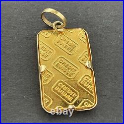 1 gram Credit Suisse 999,9 Fine Gold Minted Pendant Bar in 14K Tab Frame