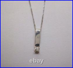 9ct White gold and diamond bar style drop pendant and 16 inch fine curb chain