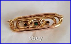 A Victorian 15ct Yellow Gold open work bar brooch. Collet set with Turquoise