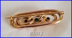 A Victorian 15ct Yellow Gold open work bar brooch. Collet set with Turquoise